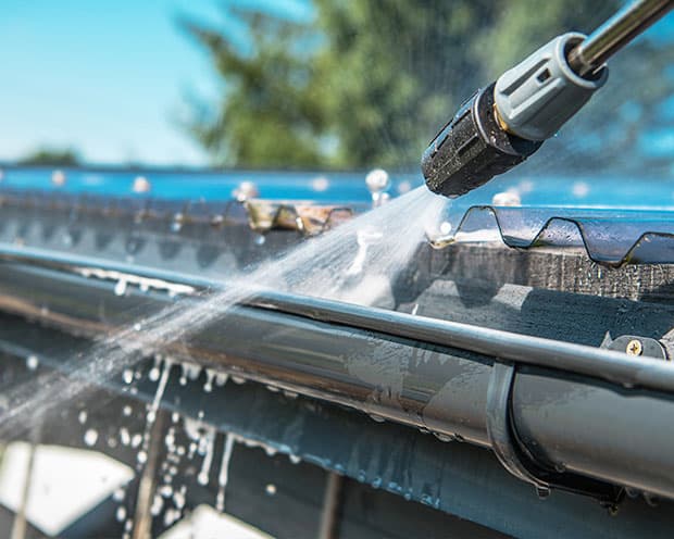 Gutter cleaning before and after in Oahu Hawaii