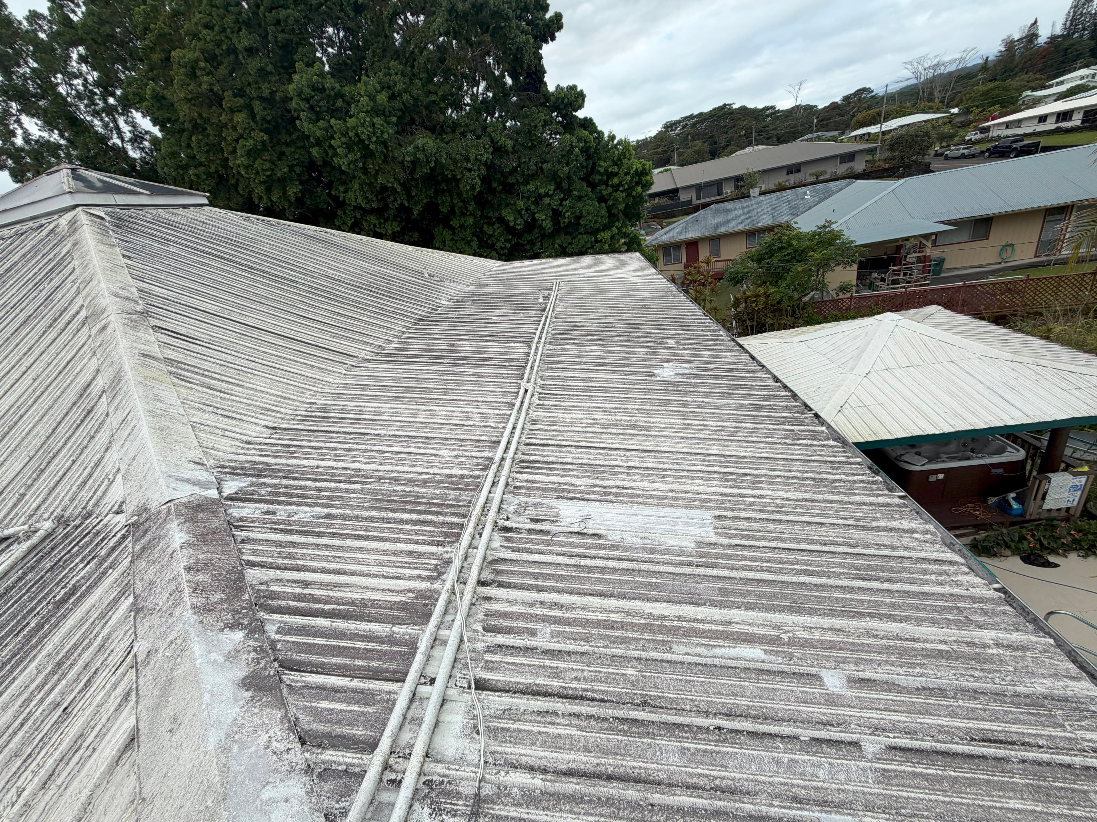 Roof before soft washing in Oahu Hawaii