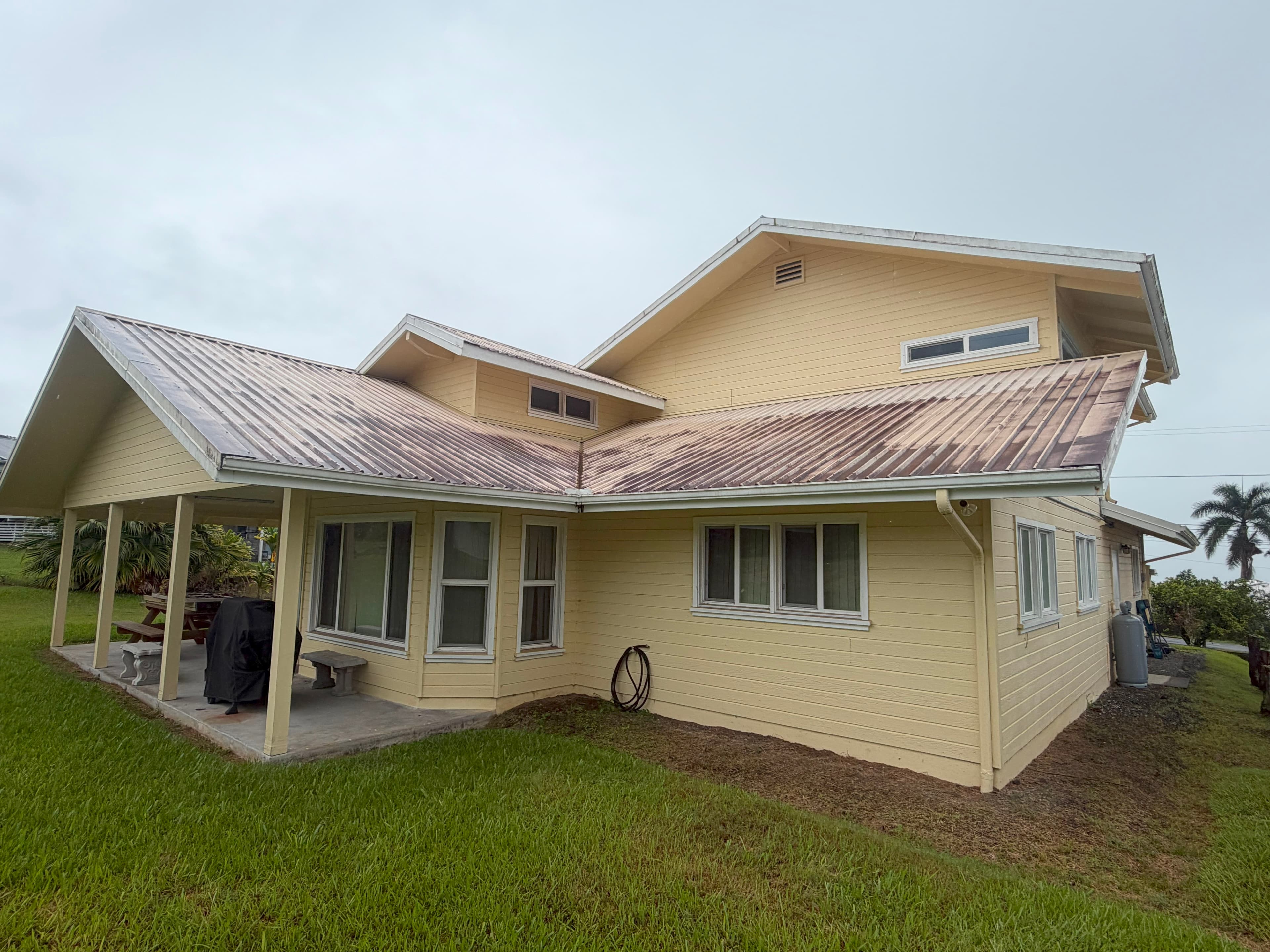 Home roof before cleaning on Big Island Hawaii